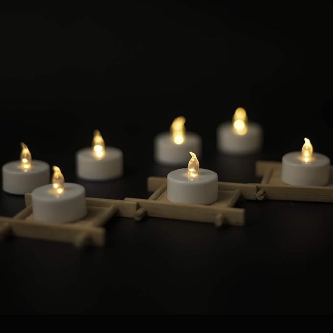 YIWER Flameless Tea Lights Candles - Realistic LED Flickering Operated Tea Lights Battery Tealights Long Lasting Electric Fake Candles in Warm White 200pcs Decoration for Party and Gifts Ideas