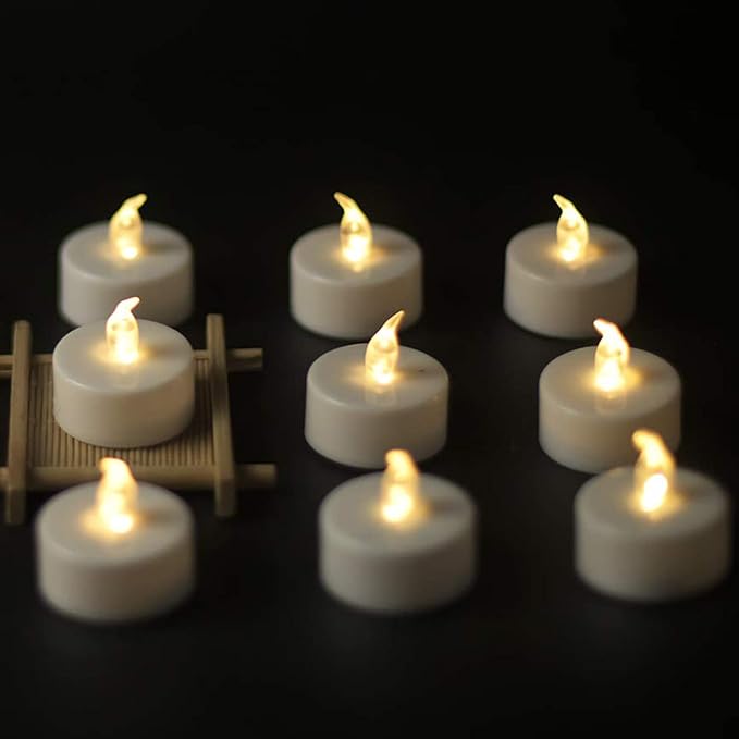 YIWER Flameless Tea Lights Candles - Realistic LED Flickering Operated Tea Lights Battery Tealights Long Lasting Electric Fake Candles in Warm White 200pcs Decoration for Party and Gifts Ideas