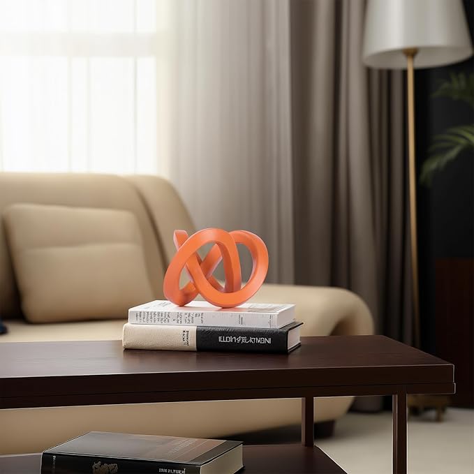 Orange knot decorative sculpture, orange home decor aesthetics, Möbius strip sculpture, suitable for decoration and display on bookshelves, living room TV cabinets, office cabinets, and coffee tables.