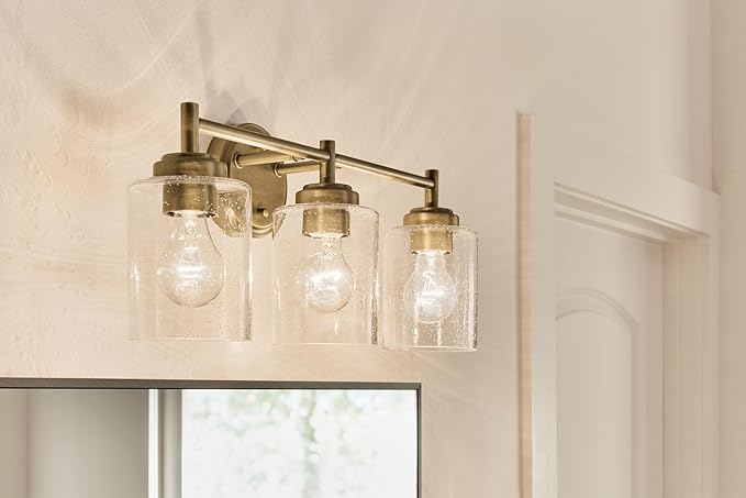 Kichler Winslow 21.5" 3-Light Vanity Light with Clear Seeded Glass in Natural Brass for Vanity, Luxe Industrial, (21.5" x 9.25"), 45886NBR