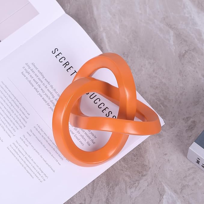 Orange knot decorative sculpture, orange home decor aesthetics, Möbius strip sculpture, suitable for decoration and display on bookshelves, living room TV cabinets, office cabinets, and coffee tables.