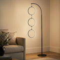Brightech Nova Modern Floor Lamp Matches Living Room Décor - Contemporary Arc Tall Lamp with 3-Circle Ring-Style Pendant - Over The Couch Standing on Arching Pole - Eclectic- Black