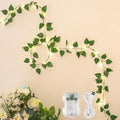 YOUNGAR Pothos Vines with Fairy Lights,Leaf String Warm White Lights Battery/USB Operated,23FT 73LED Fake for Bedroom Wall Room Wedding Birthday Garden Party Wall Room Decor