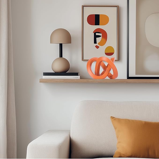 Orange knot decorative sculpture, orange home decor aesthetics, Möbius strip sculpture, suitable for decoration and display on bookshelves, living room TV cabinets, office cabinets, and coffee tables.